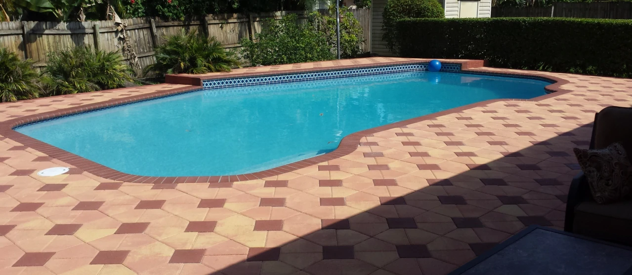 Travertine paver pool deck completed by Broward Pavers in South Florida