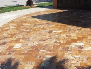 After: new herringbone paver driveway by Broward Pavers